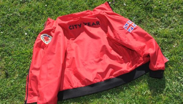CYUK red jacket on the grass